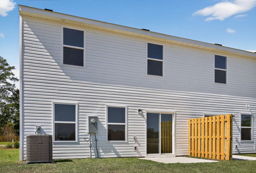 A house with a yellow gate. A house with a yellow gate.