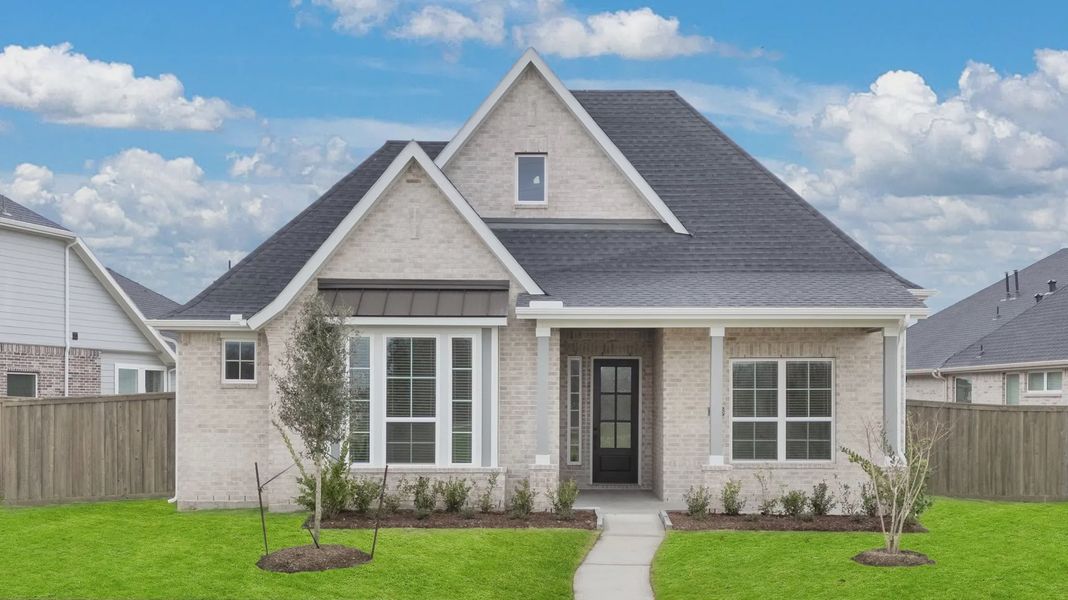 Representative exterior photo of a completed home built from the Palmer by Chesmar Homes in Riceland Alley Loads, Mont Belvieu, TX (Image 24).