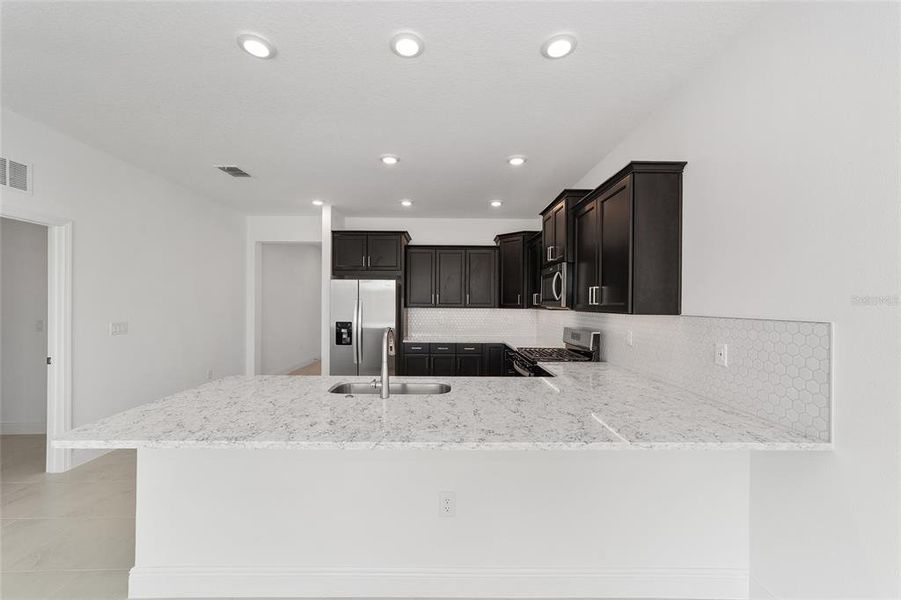 Furnished interior view inside a new home in Calesa Township, Ocala (Image 5).