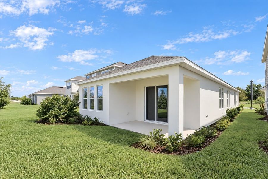 Exterior details and patio area of a home in Lochside, Mount Dora (Image 28). Exterior details and patio area of a home in Lochside, Mount Dora (Image 28).