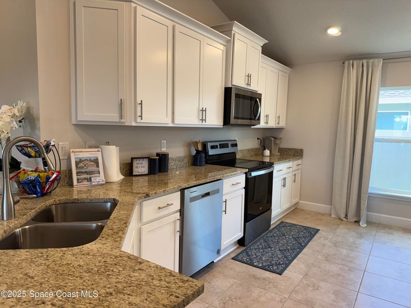 Furnished interior view inside a new home in St. John Preserve, Palm Bay (Image 6). Furnished interior view inside a new home in St. John Preserve, Palm Bay (Image 6).
