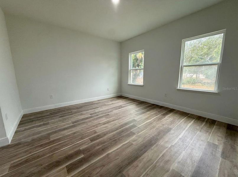 Spacious, unfurnished interior of a new home in , Port Charlotte (Image 14).