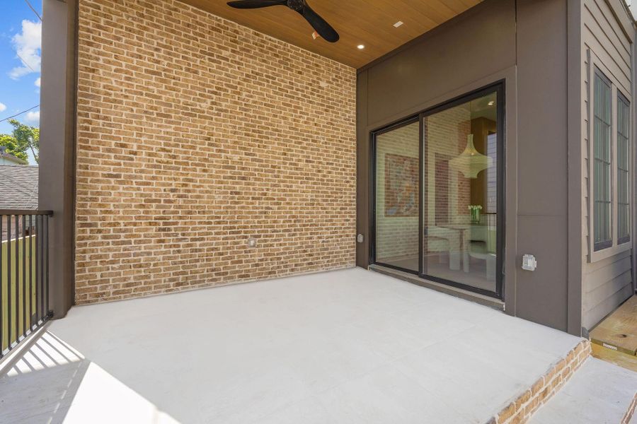 Exterior details and patio area of a home in , Houston (Image 3).