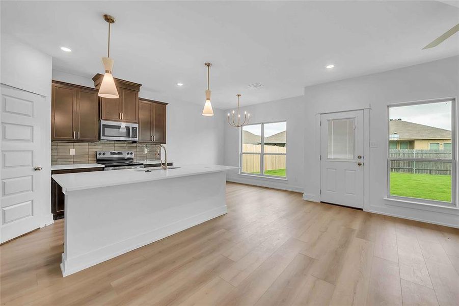 Please Note: These interior photos are not of the actual home but are of a completed one with a similar floor plan. Finishes, features, and layouts.