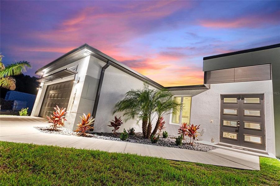 Front exterior of a new home in , Punta Gorda, FL, highlighting curb appeal (Image 21).