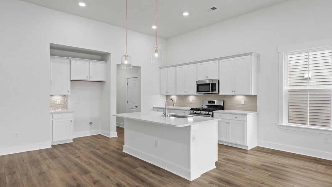 Furnished interior view inside a new home in Bluffs at Sun Colony, Longs (Image 5).