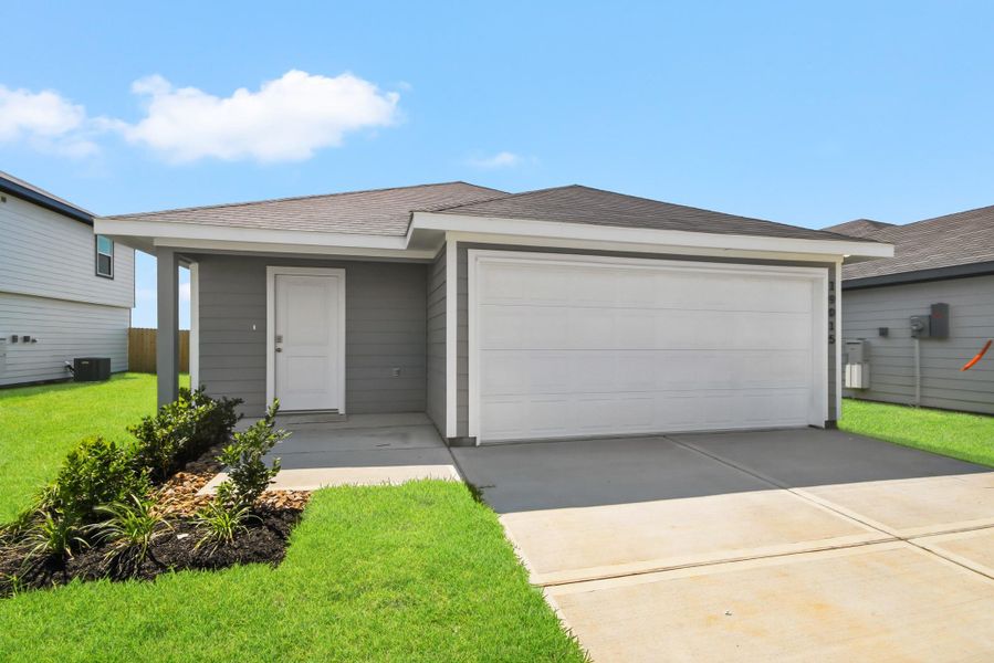 Front exterior of a new home in Sunset Valley, Hockley, TX, highlighting curb appeal (Image 1). Front exterior of a new home in Sunset Valley, Hockley, TX, highlighting curb appeal (Image 1).