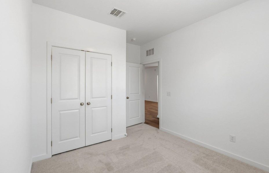 Spacious, unfurnished interior of a new home in Crosswinds, Kyle (Image 18).