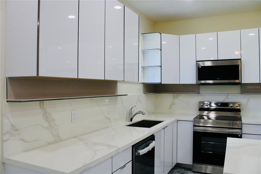 Furnished interior view inside a new home in , Port Charlotte (Image 6).