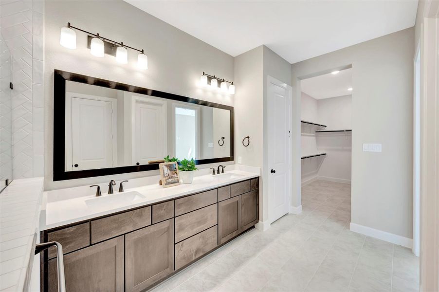 Another view of this master bath that leads to a large walk in closet