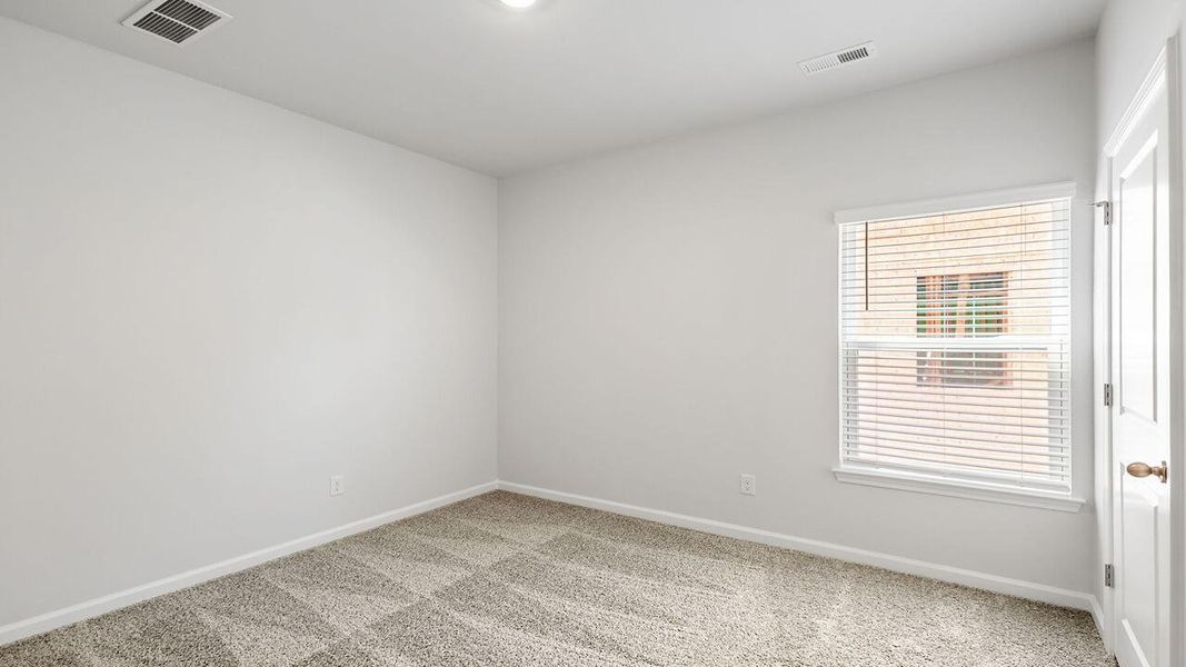 Spacious, unfurnished interior of a new home in The Crossing at St. James, Summerville (Image 26).