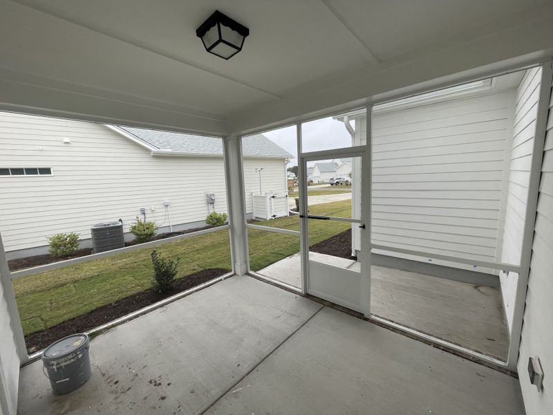 Exterior details and patio area of a home in The Sanctuary at Sunset Beach, Sunset Beach (Image 20).