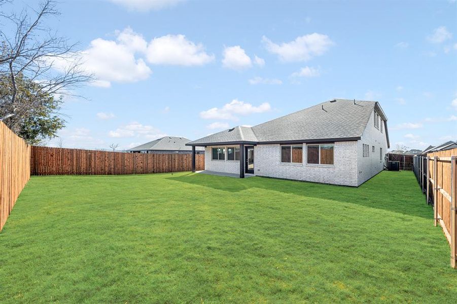 Exterior details and patio area of a home in Georgetown at Kings Fort, Kaufman (Image 4).