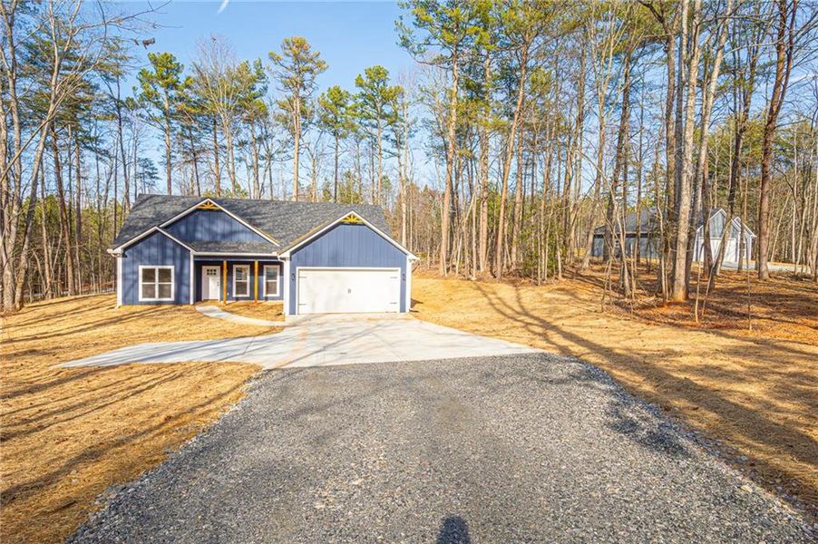 Front exterior of a new home in , Dawsonville, GA, highlighting curb appeal (Image 27). Front exterior of a new home in , Dawsonville, GA, highlighting curb appeal (Image 27).