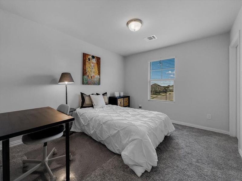 Bedroom featuring carpet