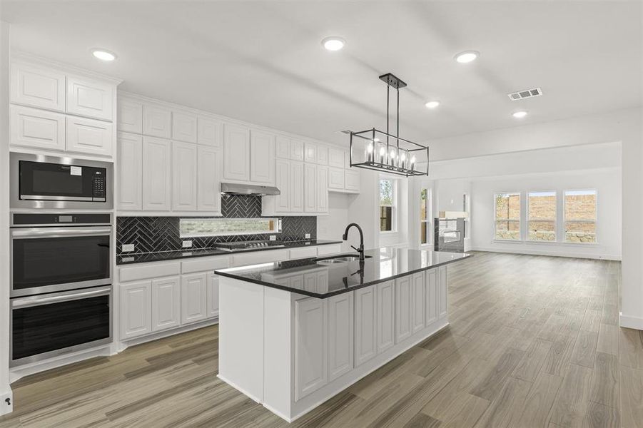 Furnished interior view inside a new home in The Villages of Hurricane Creek, Anna (Image 8). Furnished interior view inside a new home in The Villages of Hurricane Creek, Anna (Image 8).