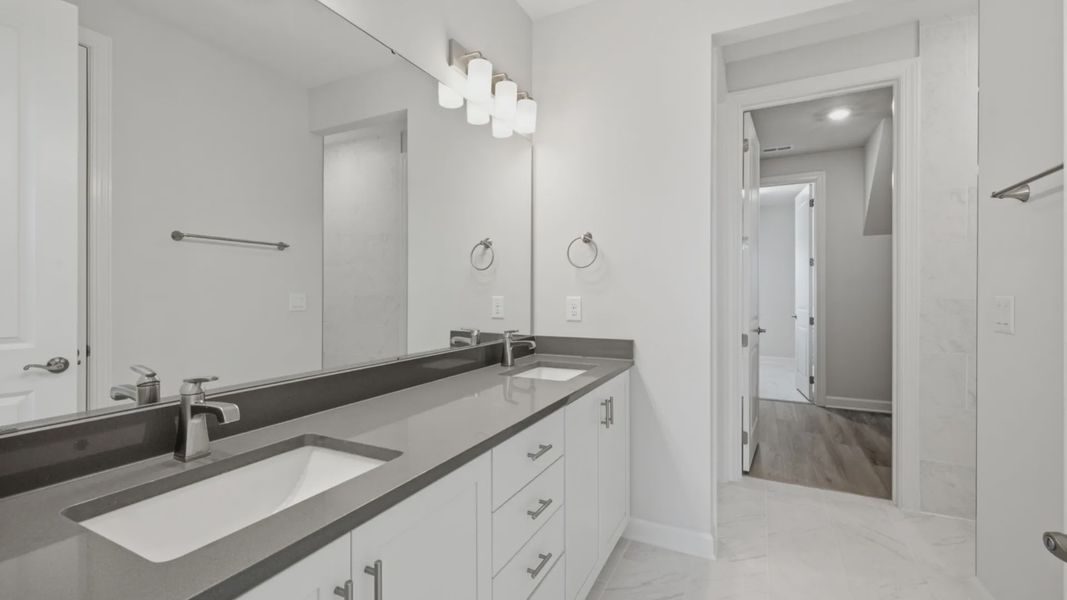 Furnished interior view inside a new home in The Courtyards at Oak Grove, Durham (Image 11).