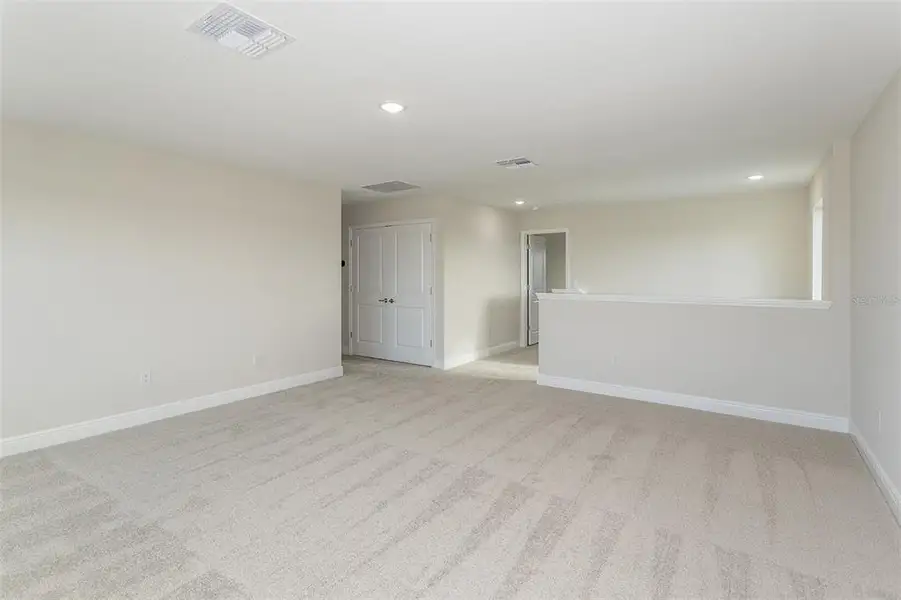 Spacious, unfurnished interior of a new home in Pasadena Woods, Dade City (Image 21).