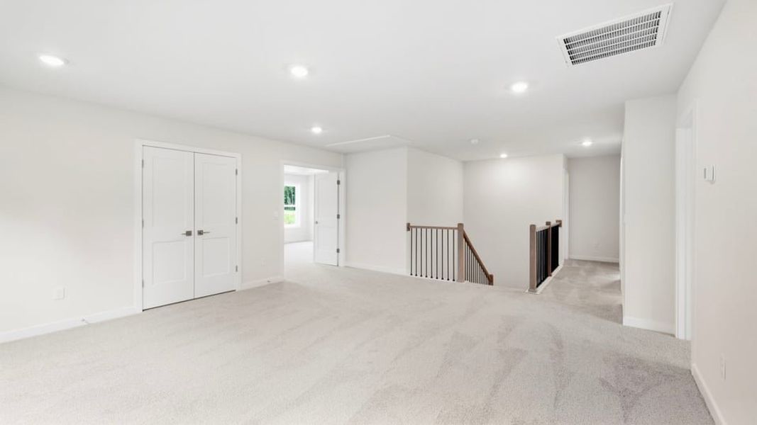 Spacious, unfurnished interior of a new home in Adams Glen, Greenville (Image 32).