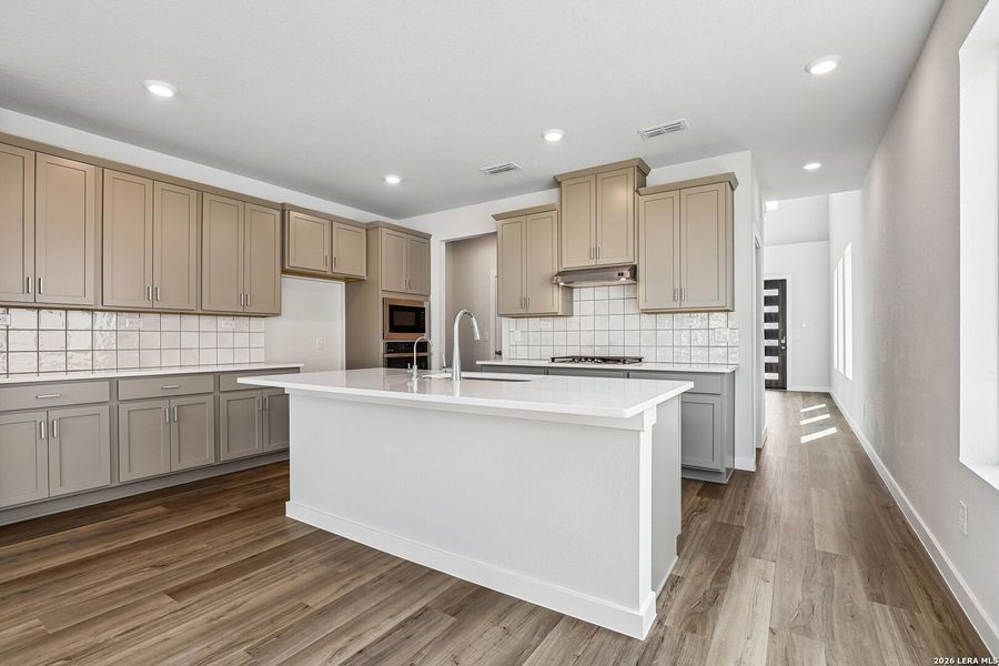Furnished interior view inside a new home in Weston Oaks, San Antonio (Image 6).