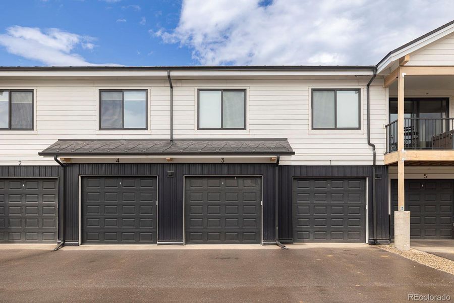 Front exterior of a new home in , Fraser, CO, highlighting curb appeal (Image 2).