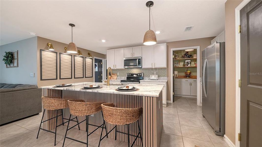 Furnished interior view inside a new home in Bella Lago, Parrish (Image 10).