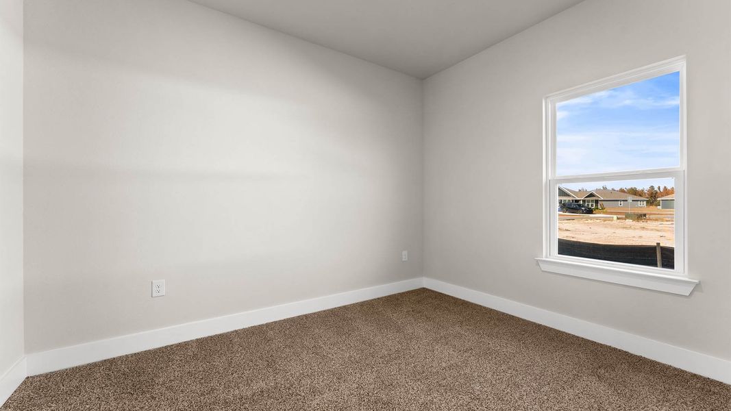 Representative unfurnished interior of a home built from the The Mckenzie by D.R. Horton in Liberty, Panama City (Image 34).