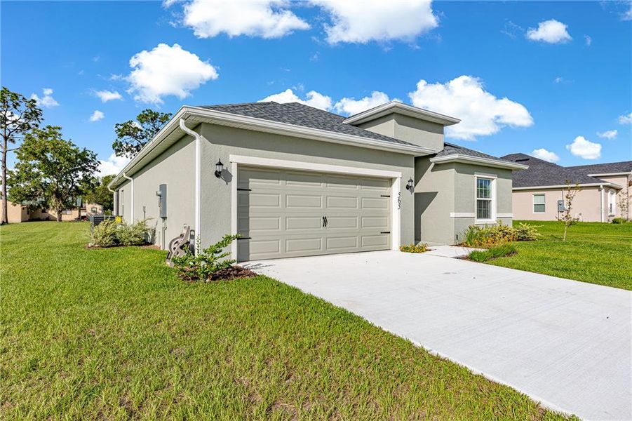 Front exterior of a new home in , Ocala, FL, highlighting curb appeal (Image 26).