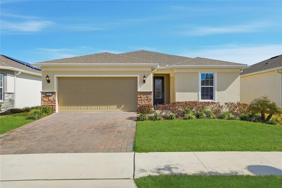 Front exterior of a new home in , St. Cloud, FL, highlighting curb appeal (Image 24).