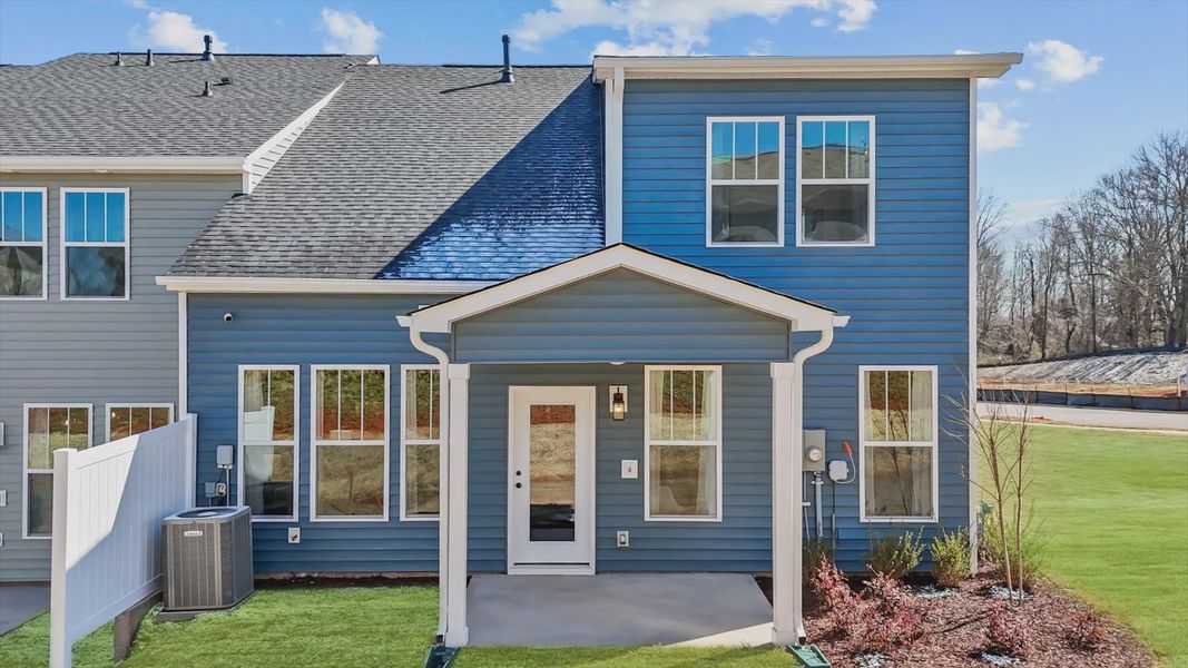 Exclusive end-unit townhome in Aspen Ridge with elegant design and high standards