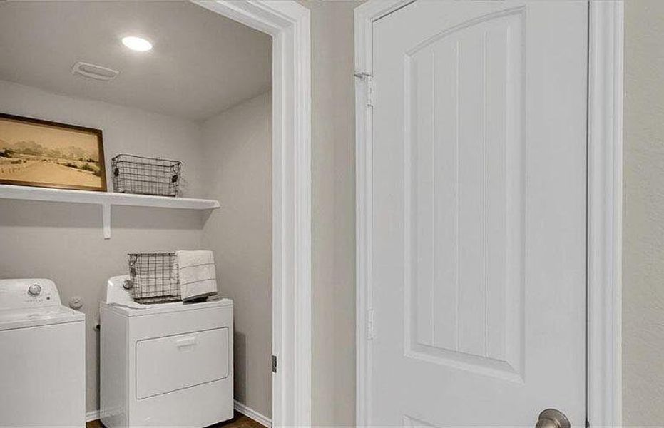 Laundry area with washing machine and clothes dryer Laundry area with washing machine and clothes dryer