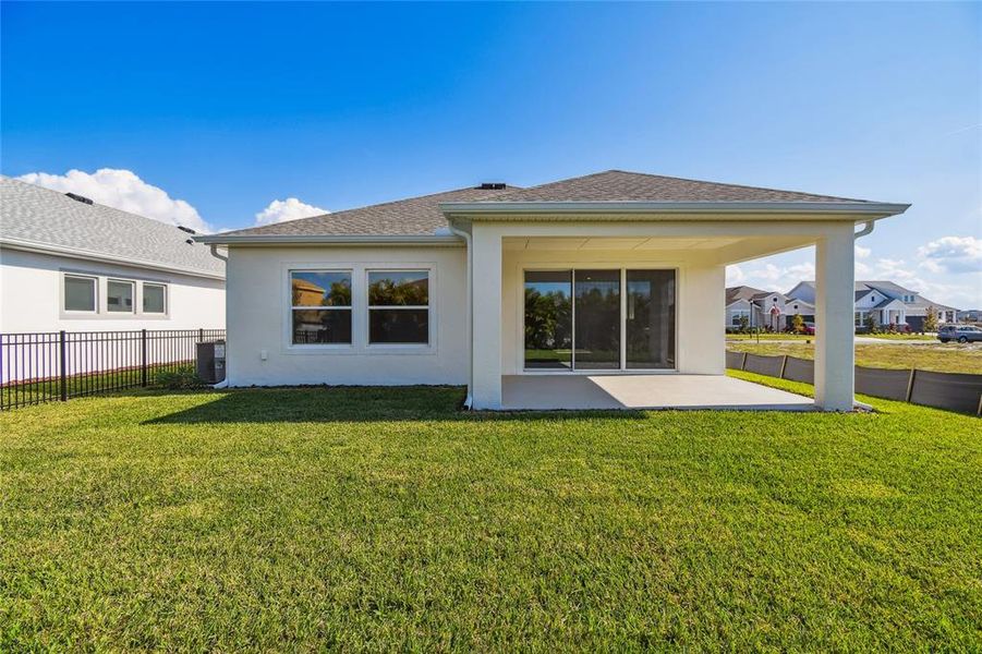 Exterior details and patio area of a home in Waterset Tradition Series, Apollo Beach (Image 24).