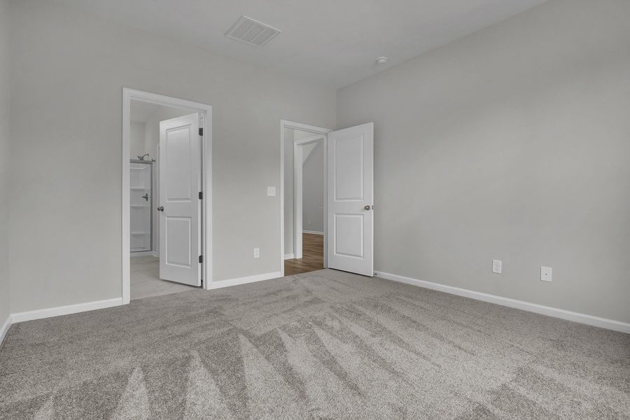 Spacious, unfurnished interior of a new home in Grand Park, Leland (Image 24). Spacious, unfurnished interior of a new home in Grand Park, Leland (Image 24).