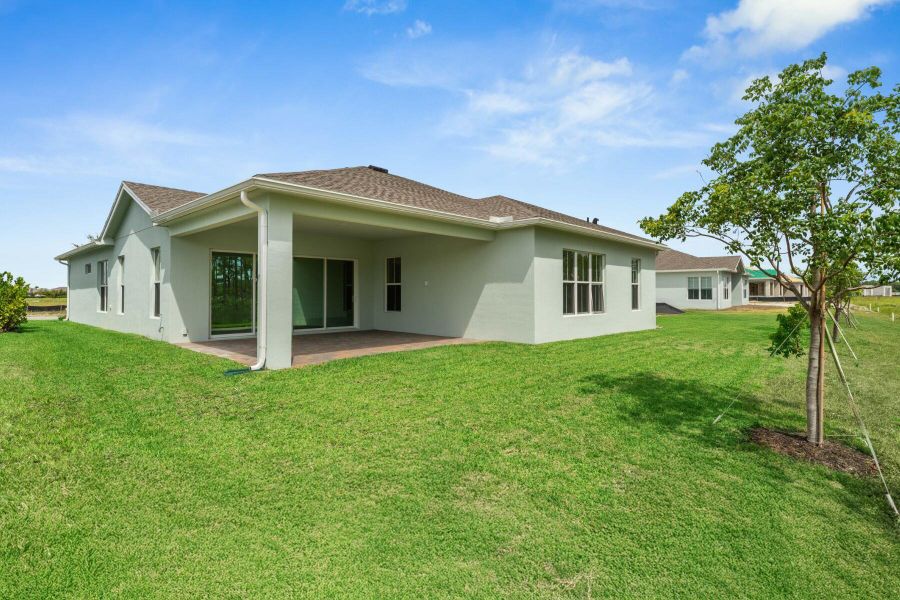 Front exterior of a new home in , Port St. Lucie, FL, highlighting curb appeal (Image 1). Front exterior of a new home in , Port St. Lucie, FL, highlighting curb appeal (Image 1).
