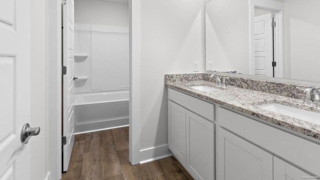 Furnished interior view inside a new home in Vineyard Trail, Jacksonville (Image 13).