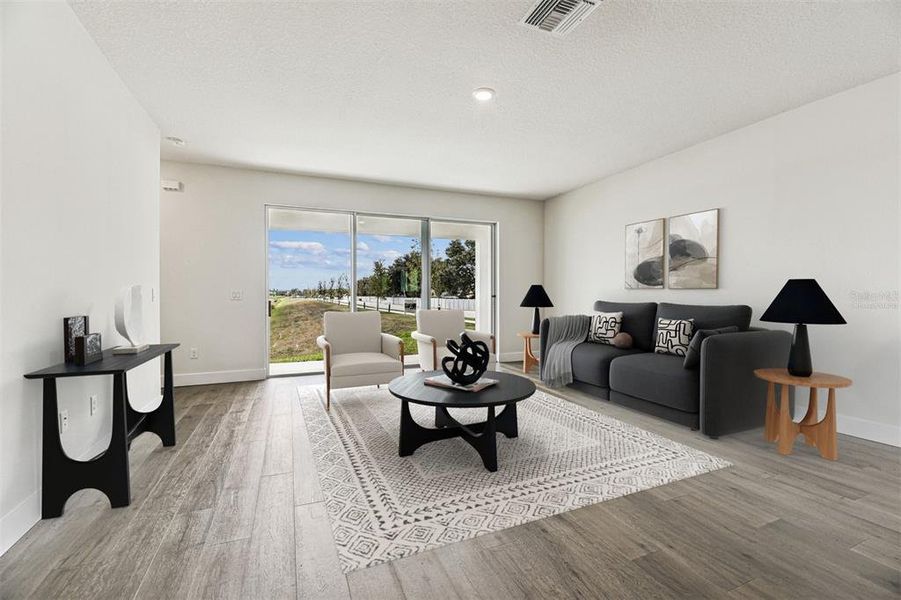 Furnished interior view inside a new home in The Peninsula at Rhodine Lake, Riverview (Image 8).