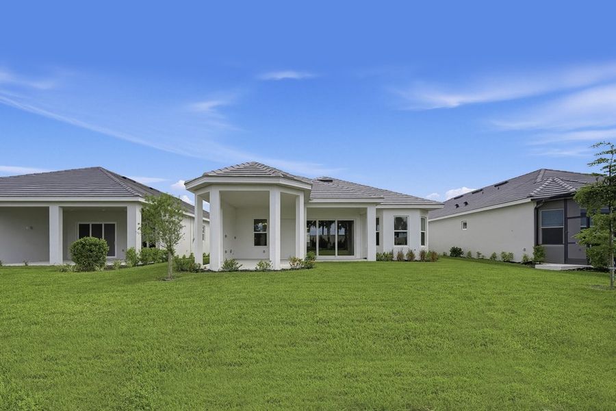 Exterior details and patio area of a home in Esplanade at Azario Lakewood Ranch, Bradenton (Image 3).