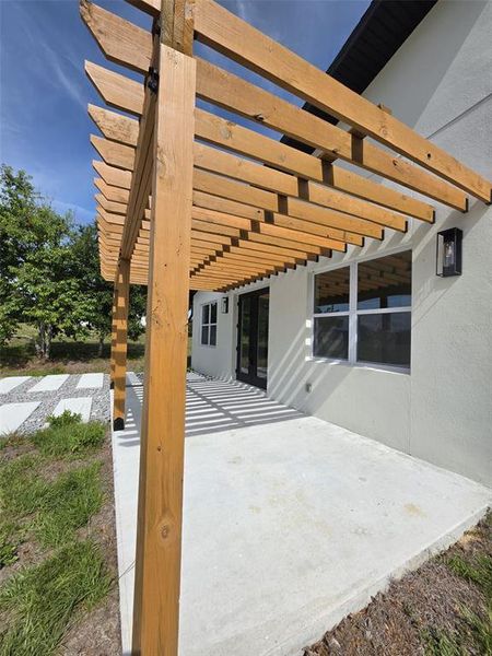 Exterior details and patio area of a home in , Morriston (Image 15).