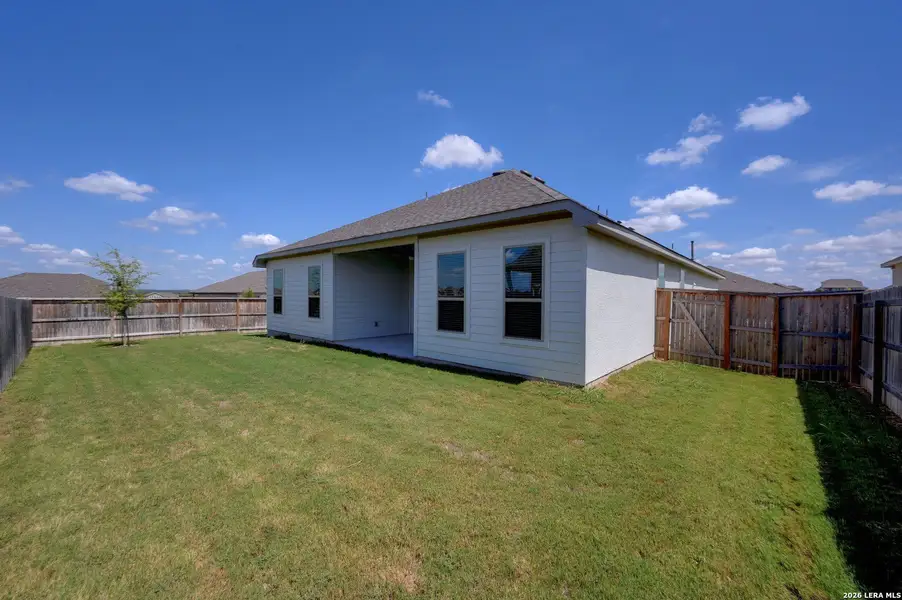 Exterior details and patio area of a home in The Parklands, Schertz (Image 27).