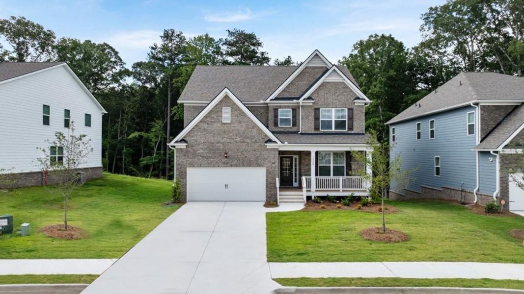 Front exterior of a new home in Butner Estates, South Fulton, GA, highlighting curb appeal (Image 9).