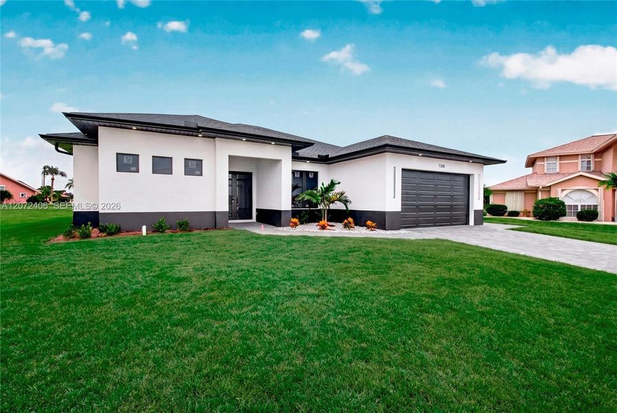 Front exterior of a new home in , Punta Gorda, FL, highlighting curb appeal (Image 1). Front exterior of a new home in , Punta Gorda, FL, highlighting curb appeal (Image 1).