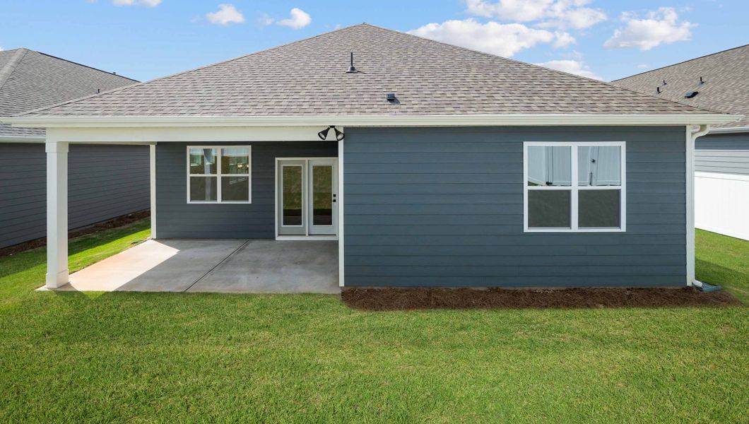 Exterior details and patio area of a home in The Villas at Pine Valley, Boiling Springs (Image 2).