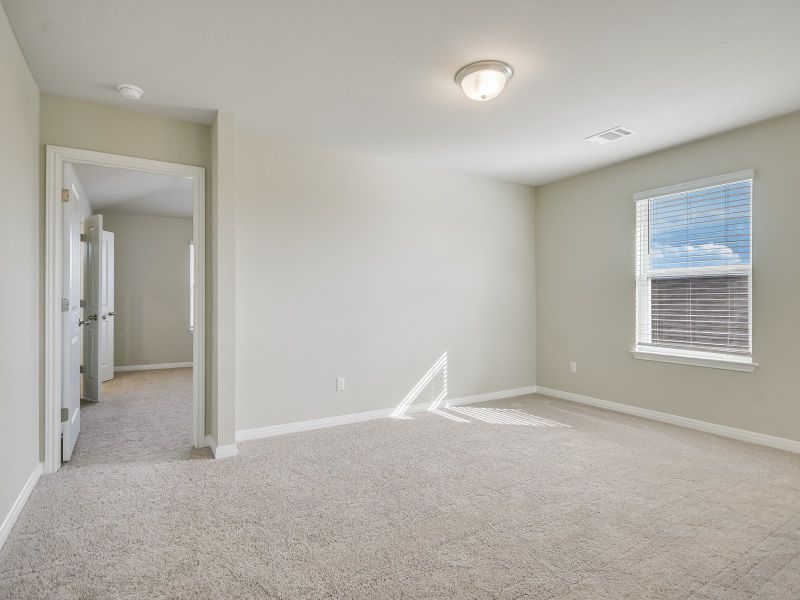 Spacious, unfurnished interior of a new home in Butler Farms - Americana Collection, Liberty Hill (Image 7).