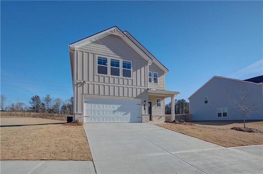 Front exterior of a new home in Chapel Hill, Newnan, GA, highlighting curb appeal (Image 14).