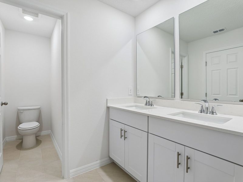 Furnished interior view inside a new home in The Meadow at Crossprairie Townes, St. Cloud (Image 7).