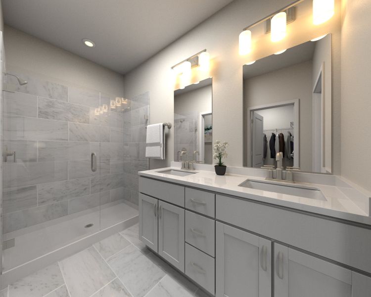 The primary bathroom offers dual vanity sinks and a walk-in shower. The primary bathroom offers dual vanity sinks and a walk-in shower.