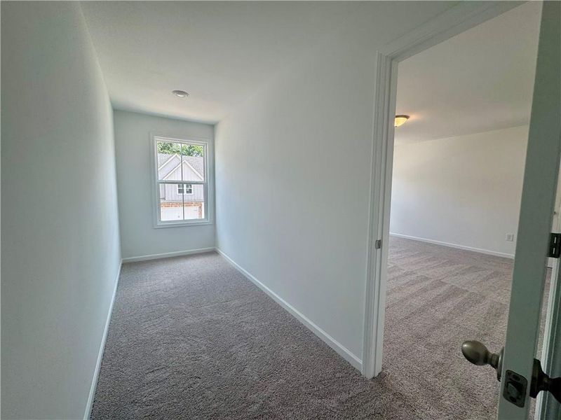 Spacious, unfurnished interior of a new home in Eastlyn Crossing - Single Family, Flowery Branch (Image 27). Spacious, unfurnished interior of a new home in Eastlyn Crossing - Single Family, Flowery Branch (Image 27).