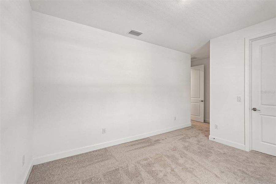 Spacious, unfurnished interior of a new home in Tiburon, Nokomis (Image 39).