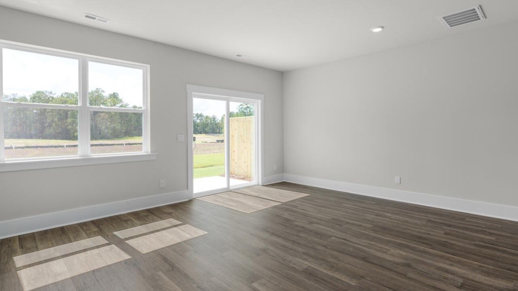 Representative unfurnished interior of a home built from the CARDINAL by D.R. Horton in Indigo Preserve Townhomes, Leland (Image 17).