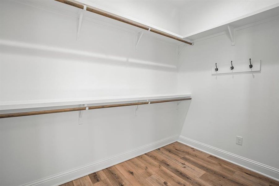 Walk in closet in primary bedroom Walk in closet in primary bedroom